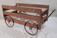 Home Decor Plant Stand Metal Wagon . Measures 19.5"&times;9 &frac34;"&times;10.5" . Wheels do not rotate .