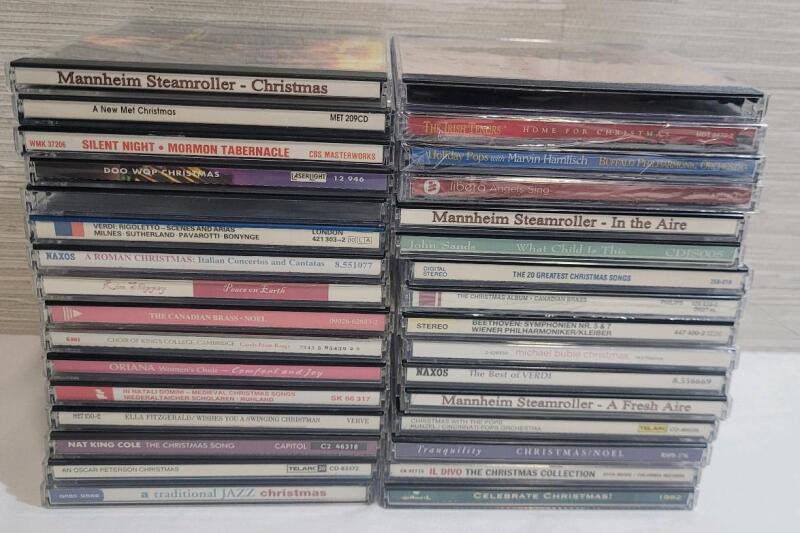 32 Holiday CDs . Not all cases checked for correct CD