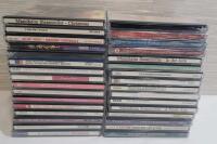 32 Holiday CDs . Not all cases checked for correct CD