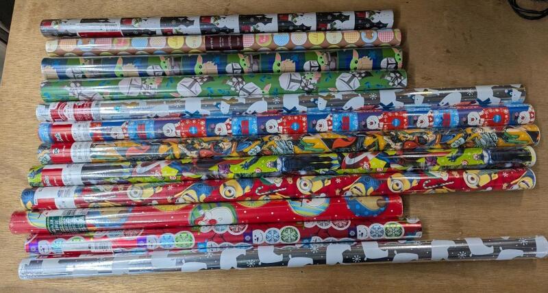 12 New Rolls of Wrapping Paper. Marked Between 20sq feet and 70sq Feet.