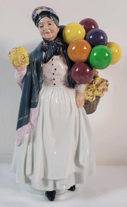 Royal Doulton " Biddy Penny Farthing " Figurine , HN 1843 . Measures 8 &frac34;" tall . No chips or cracks