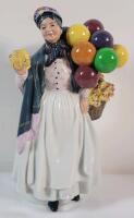 Royal Doulton " Biddy Penny Farthing " Figurine , HN 1843 . Measures 8 &frac34;" tall . No chips or cracks