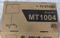 MT1004 TV Stand. All Parts Present, no hardware included.