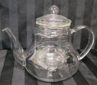 Asiatica Pear Shape Clear Glass Tea Pot w/Leaf Stainer & Lid . Measures 6.5" tall . No chips or cracks