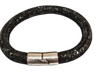 Authentic Swarovski ( Swan logo stamp) Crystal Mesh Bracelet "Stardust" in Black and Silver Tones with sparkly Tonal Crystals Caged in Mesh closes with magnetic clasp Approximately 7.25&rsquo;&rsquo;
