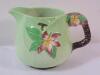 Carlton Ware Apple Bloom Green Jug & Creamer . Measures 5" & 3.5" tall . Creamer has crack on handle - 5