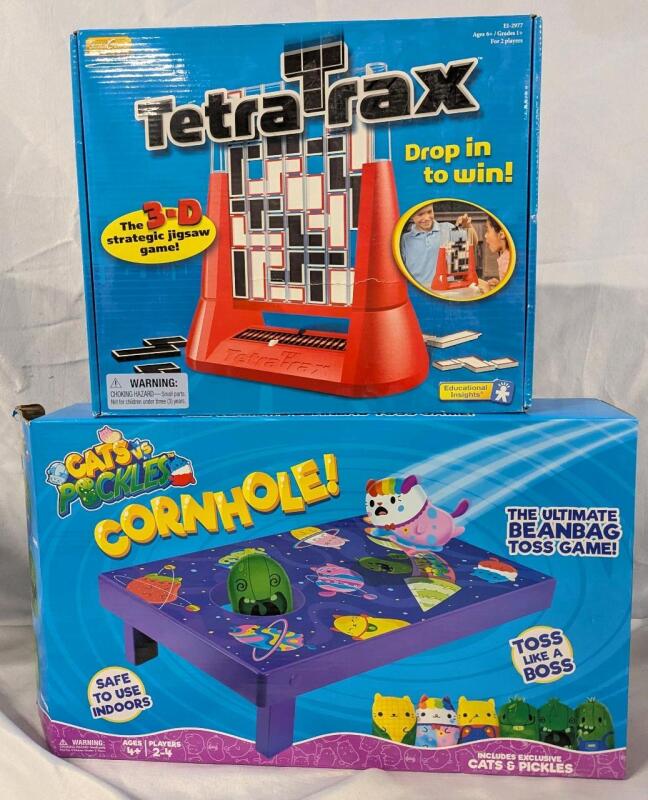 2 Children's Games. Cats Vs Pickles Cornhole Game (Missing bean bangs) and New Sealed Tetra Trax 3D Jigsaw Game.