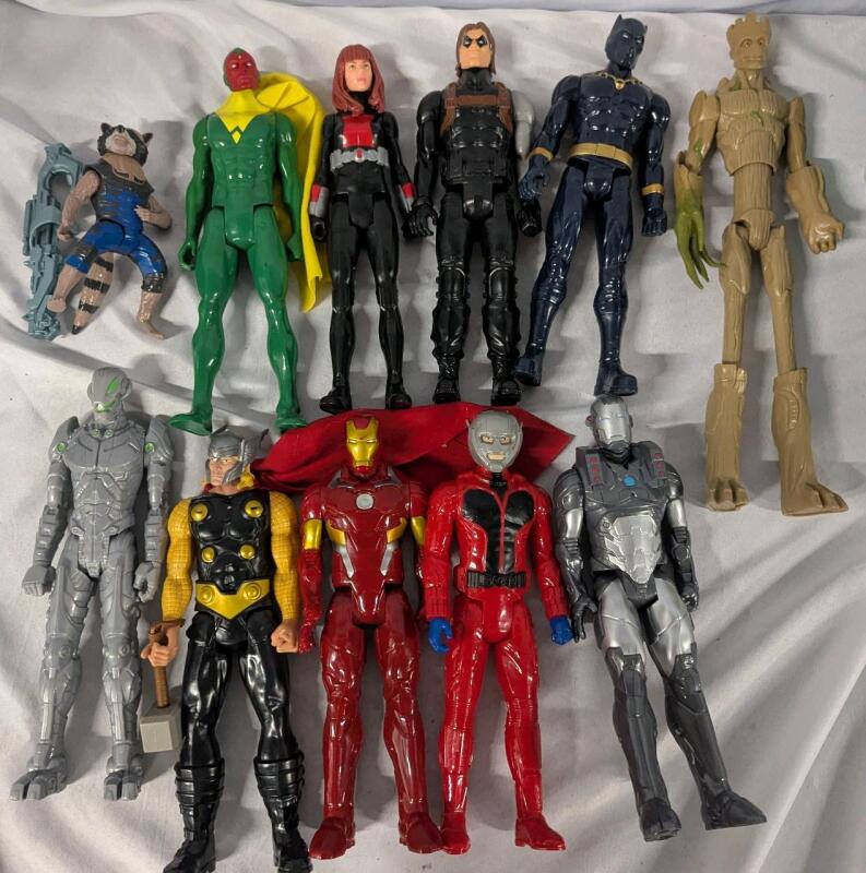 11 Marvel Action Figures. Tallest Measures 15" Tall.
