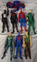 7 Action Figures with accessories. 7 Marvel Spiderman (and Associates) and 1 Saban Rita Repulsa. Tallest Measures 12.5"