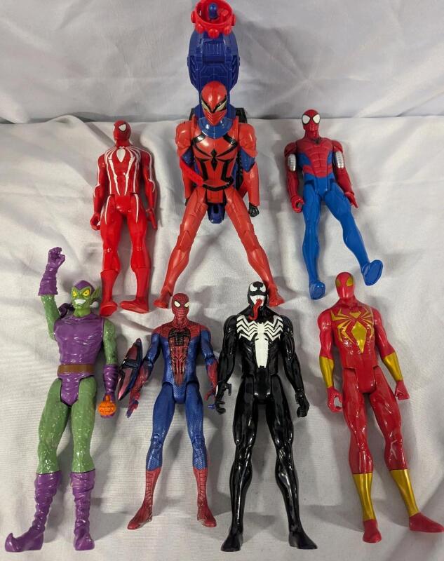 7 Spider-Man Action Figures with Accessory. Tallest Measures 11.5"