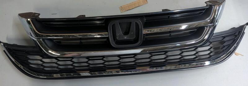 New Front Bumper with Upper and Lower Grille. Compatible with 2010-2011 Honda CR-V. Replacement for 71122-SWN-H11 71121-SWN-H11 Retails for over $150
