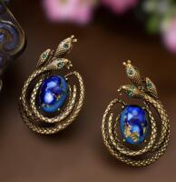 Bohemian Vintage Syle Earrings 3 Textured Reptiles with Green Emerald Eyes Encircling a Beautiful Domed Cabochon approximately 1.75&rsquo;&rsquo; Pierced post back