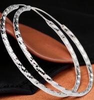Marked 925 Sterling Statement Hoop Earrings with Sparkling Star Texture Design Slide in Pierced Clasp Approximately 2.5 inches! Stock photo with model