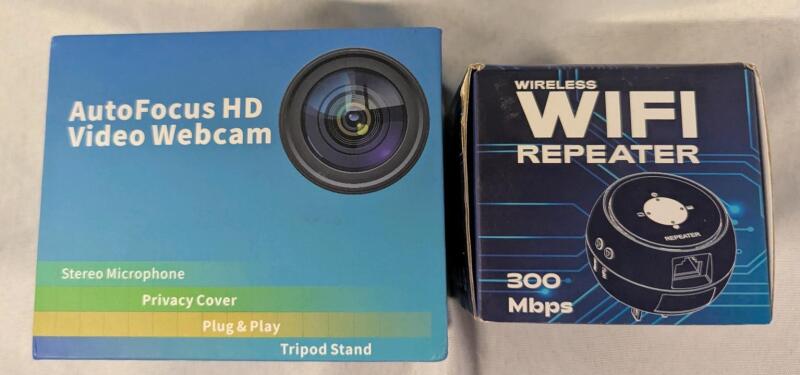 2 As New In Box Assorted Computer Accessories. Webcam & WiFi Repeater.