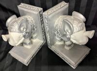 2 Elephant Bookends. 7.25" Tall, 4.5" Wide and 5.75" Deep.