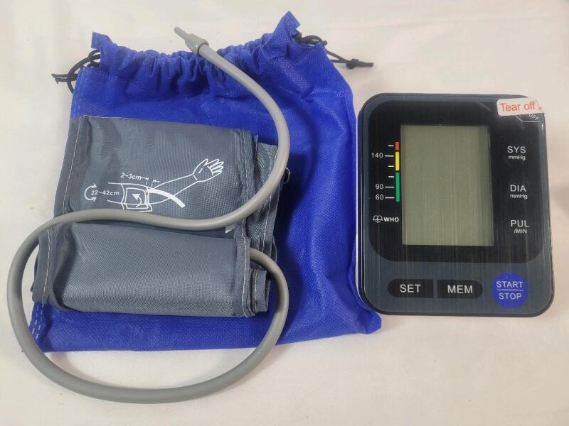 Arm-Type Electronic Blood Pressure Monitor . Tested Powers Up , Not Tested Beyond Power Up . Requires 4 AA Batteries (included)
