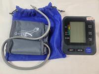 Arm-Type Electronic Blood Pressure Monitor . Tested Powers Up , Not Tested Beyond Power Up . Requires 4 AA Batteries (included)