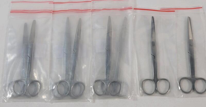4prs. New Stainless Steel Surgical Scissors . One (1) Straight Scissor & One (1) w/Slight Curve at Blade . Scissors measure 5.5" long .