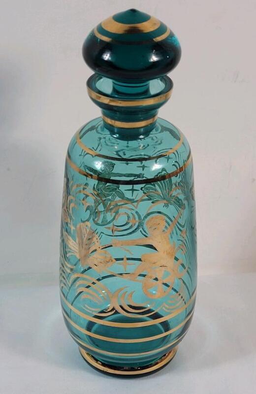 Vintage Teal & Gold Decantor w/Top . Measures 8 ⅞" tall . No chips or cracks . Minor wear to gold design