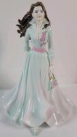 Coalport Ladies of Fashion " Sarah " Figurine . Measures 8 ⅜" tall . No chips or cracks