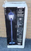 As New - Hampton Bay Outdoor Post Lantern w/Black Finish . Cast Aluminum , 10ft Cord , Dimmer Control . Measures 54"-72" tall when assembled . Open Box