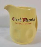 Grand Macnish Scotch Whisky Ceramic Water Jug . Measures 5.5" tall . No chips or cracks .