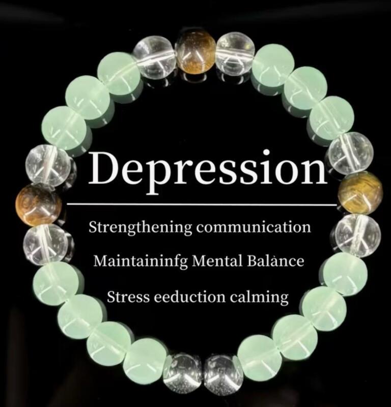 Green & Brown 8mm Bead Flex Bracelet with Black Serene Mint-Green Center & Clear Beads Mental Balance & Calming Eudaimonia Chain Stock photos added