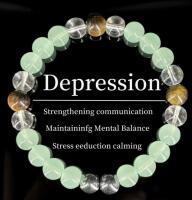 Green & Brown 8mm Bead Flex Bracelet with Black Serene Mint-Green Center & Clear Beads Mental Balance & Calming Eudaimonia Chain Stock photos added