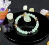 Green & Brown 8mm Bead Flex Bracelet with Black Serene Mint-Green Center & Clear Beads Mental Balance & Calming Eudaimonia Chain Stock photos added - 3