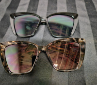 2 new pairs of ladies sunglasses. Black and leopard colour