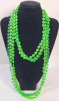 Vintage Late 60s / Early 70s Triple Strand Beaded Necklace w/Glow under Black Light Beads . Measures 50" Long