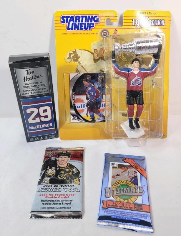 NHL Hockey Sports Memorabilia Lot . 2024-25 UD Series Two Sealed Wax Pack , 1991 Ultimate Draft Sealed Wax Pack , 1998 Joe Sakic Starting Lineup & 2019 Tim Hortons MacKinnon Hockey Stick