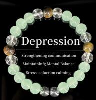 Green & Brown 8mm Bead Flex Bracelet with Black Serene Mint-Green Center & Clear Beads Mental Balance & Calming Bead Stock photos added