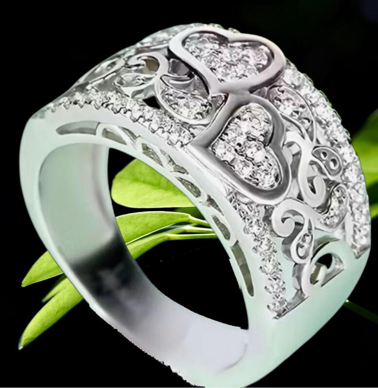 New Marked S925 Sterling Silver Size 10 Ring Inlaid with Sparkling Clear Clusters With Cutwork Swirls and Joined Hearts