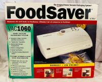 As-New Foodsaver Vacuum Sealer, VAC1060, Plus Variera Metal Shelf Organizer/Insert and Instructional VHS