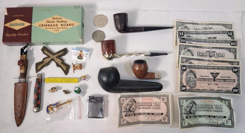 Vintage Junk Drawer Lot . Includes : Smoking Pipes , Vintage Canadian Tire Bucks , Butane Lighter , Lapel Pins , Pocket Knives Travel Cribbage Board , Coins .