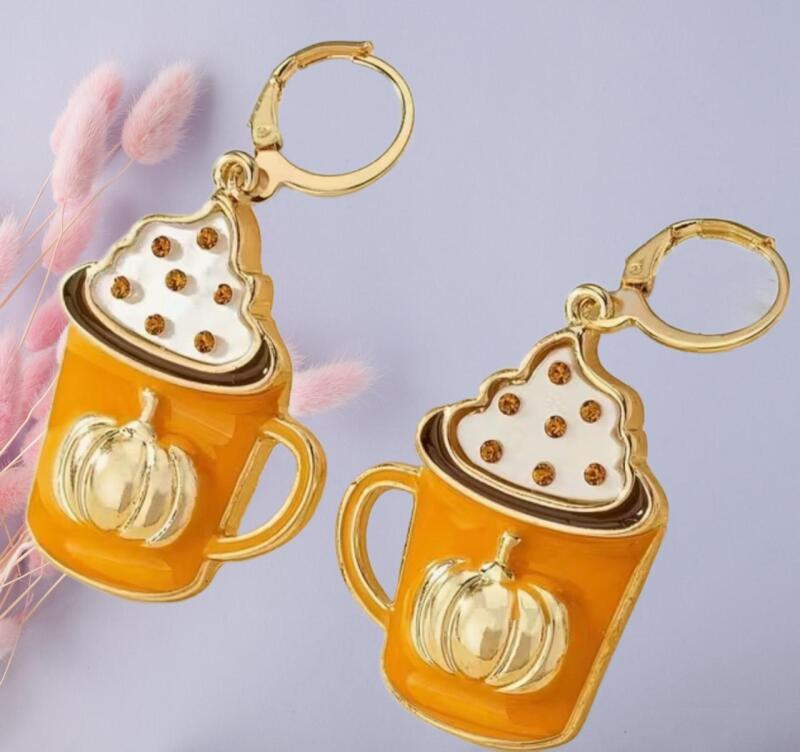 Autumn Harvest Rhinestone Enamel Pumkin Latte Dangle Earrings with Sparkling Rhinestone Pumpkin & Coffee Cup Design Hoop sliders Approximately 1.75&rsquo;&rsquo; drop Stock Photo with Model