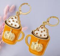 Autumn Harvest Rhinestone Enamel Pumkin Latte Dangle Earrings with Sparkling Rhinestone Pumpkin & Coffee Cup Design Hoop sliders Approximately 1.75&rsquo;&rsquo; drop Stock Photo with Model