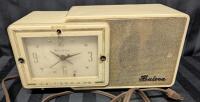 Vintage Bulova Clock Radio. Clock Turns When Plugged In. Knobs Missing, Unable to test. 11.5" Wide