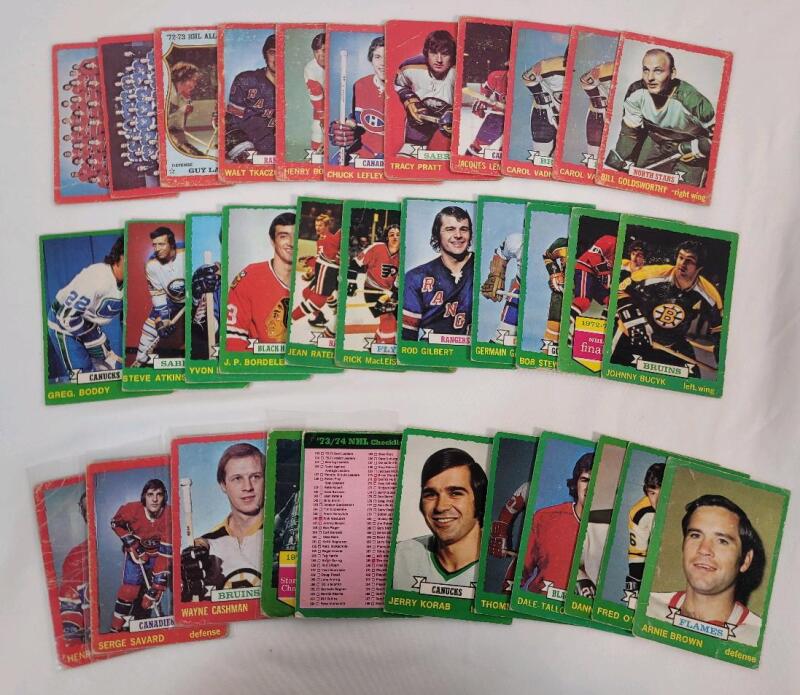 1973 - 1974 O Pee Chee NHL Hockey Trading Card Singles , 33 Trading Cards .