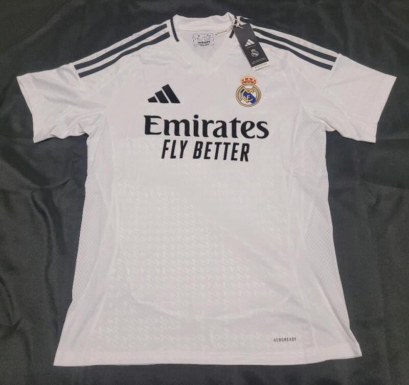 As New w/Tags - Size Medium Real Madrid #9 MBAPP&Eacute; Soccer Home Jersey . Small purple mark on front