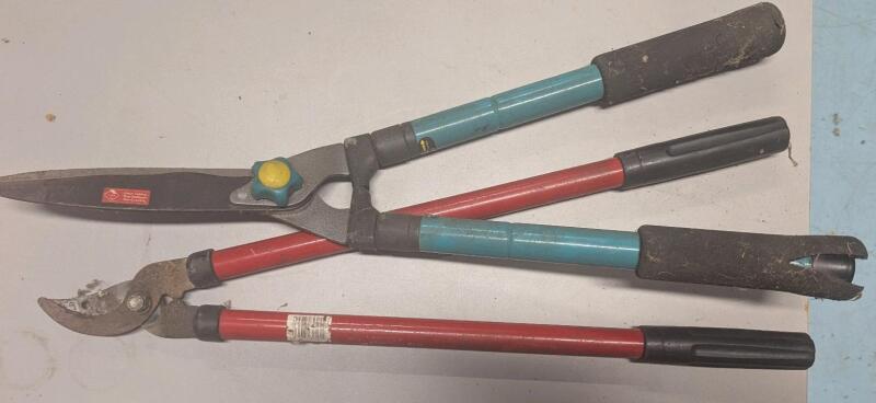 2 New Gardening Tools. Hedge Trimmer and Tree Pruner. Pruner measures 24" Long.