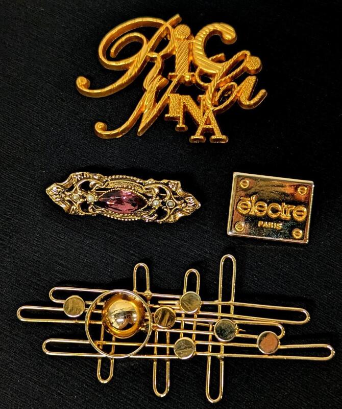 4 Vintage Metal Brooches incl NINA RICCI Signature & &Eacute;lectre Paris. up to 3.5"