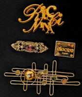 4 Vintage Metal Brooches incl NINA RICCI Signature & &Eacute;lectre Paris. up to 3.5"