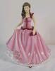 Royal Doulton " Shannon " Figurine , HN 5611 . Signed on Bottom . Canadian Exclusive Figure of the year 2013 . Measures 8 &frac34;" tall . No chips or cracks