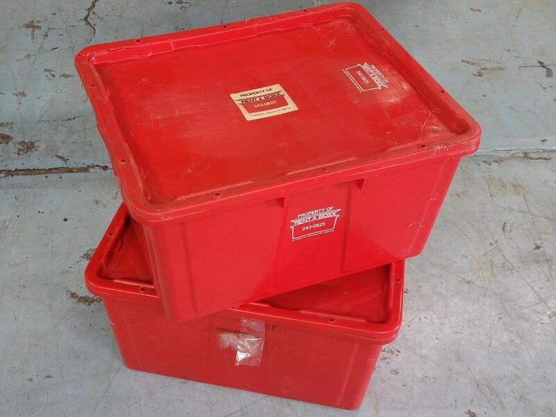 Two (2) Red Storage Bins w/Lids . Measures 24"&times;19 &frac34;"&times;12" each . Small crack in the bottom of both bins