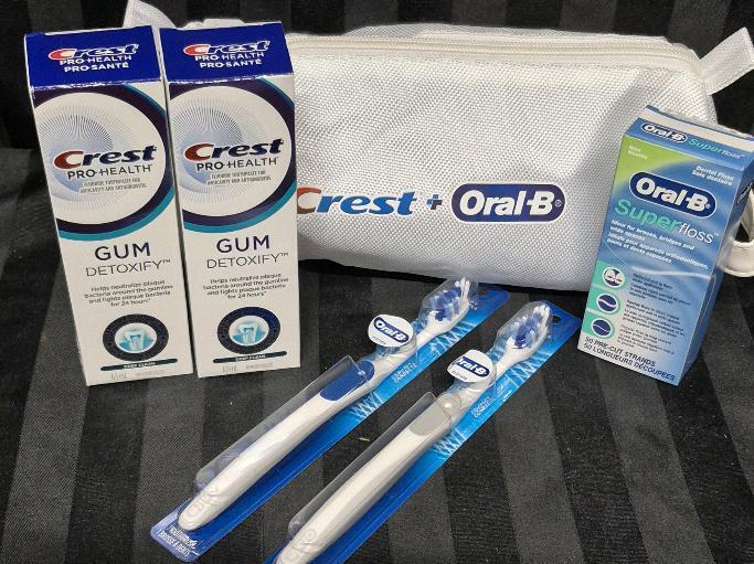 New Crest & Oral-B Mouthcare Lot - 2 Crest Toothpaste, Oral-B Floss, 2 Toothbrushes & Toiletry Bag 9.5" Long & 4" Wide