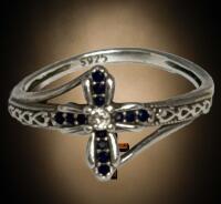 Stamped 925 Cross Rings Small Clear Stone at Centre with 3 Black stones on each arm Size 5.5