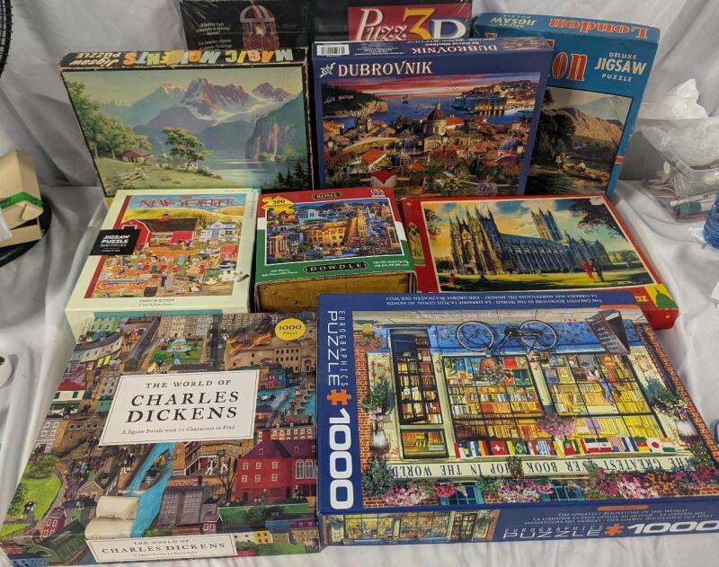 9 puzzles. 2 Sealed. Hand count of pieces not performed.