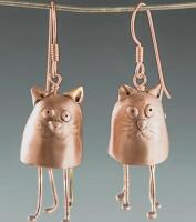 Vintage Inspired Cat Earrings Hand-Carved Copper Hoops with Black Etched Face Intricately Carved Cat-Shaped Earrings Sheppard Hooks approximately 1.5&rsquo;&rsquo; drop. Little paws hang down stock photos added